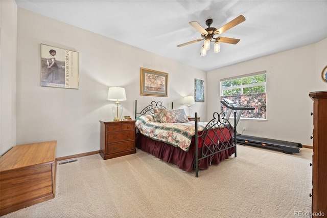 22312 E Plymouth Cir, Aurora, CO 80016 - carpeted bedroom featuring baseboards, ceiling fan, and a baseboard radiator