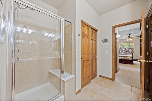 22312 E Plymouth Cir, Aurora, CO 80016 - full bathroom featuring connected bathroom, a stall shower, tile patterned floors, and ceiling fan