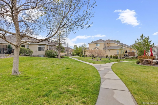 22312 E Plymouth Cir, Aurora, CO 80016 - view of community with a lawn and a residential view