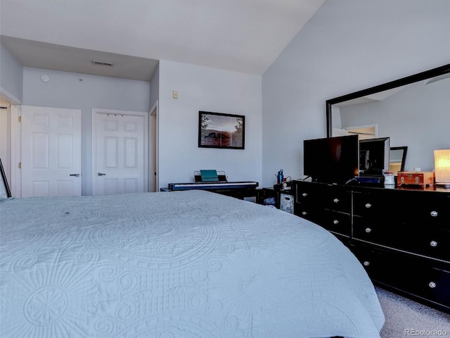 bedroom with vaulted ceiling