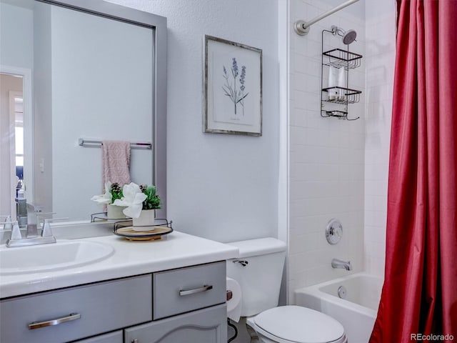 full bathroom with toilet, vanity, and shower / bath combo with shower curtain