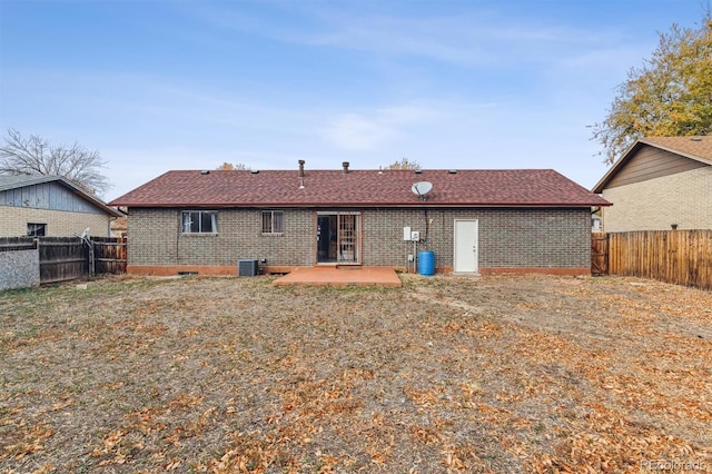 back of house with cooling unit and a patio area