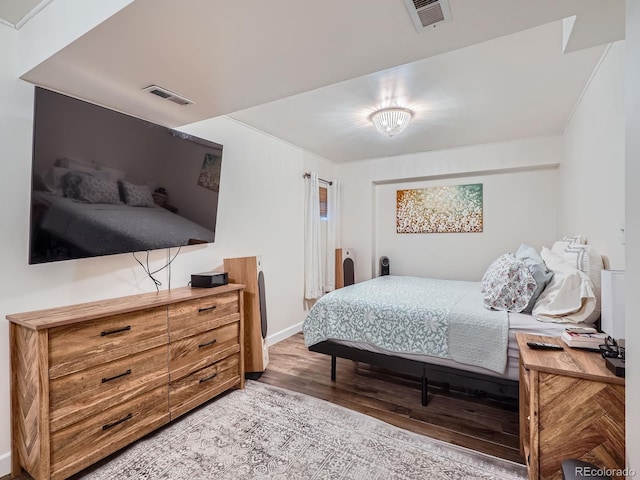 bedroom with light hardwood / wood-style flooring