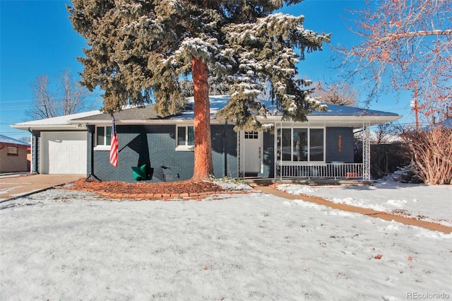 single story home with a garage