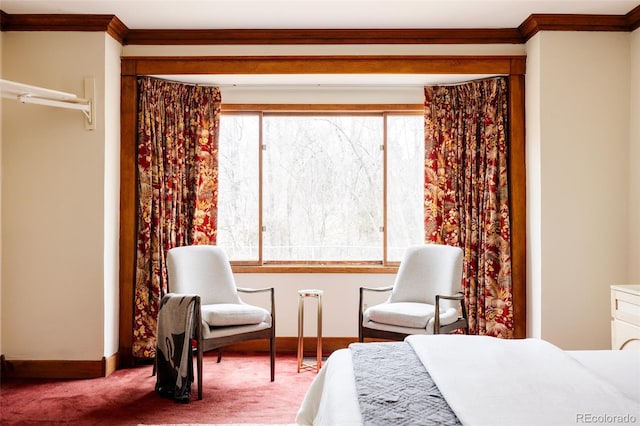 bedroom with crown molding, carpet flooring, and baseboards