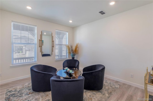 8240 S White Crow St, Aurora, CO 80016 - living area featuring light wood-type flooring, baseboards, and recessed lighting