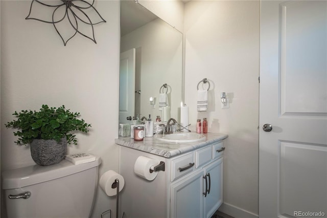 8240 S White Crow St, Aurora, CO 80016 - bathroom featuring toilet and vanity