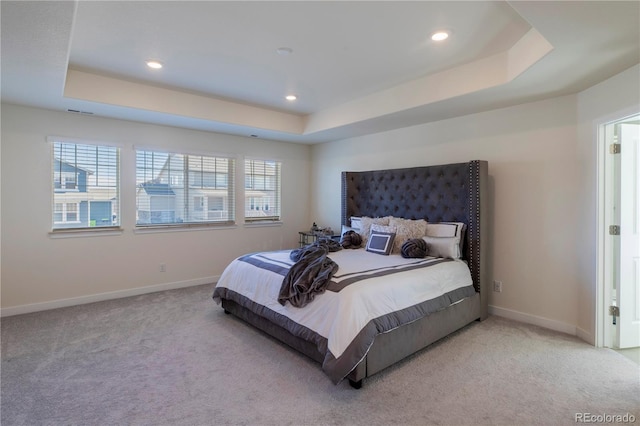 8240 S White Crow St, Aurora, CO 80016 - carpeted bedroom featuring a raised ceiling, baseboards, and recessed lighting