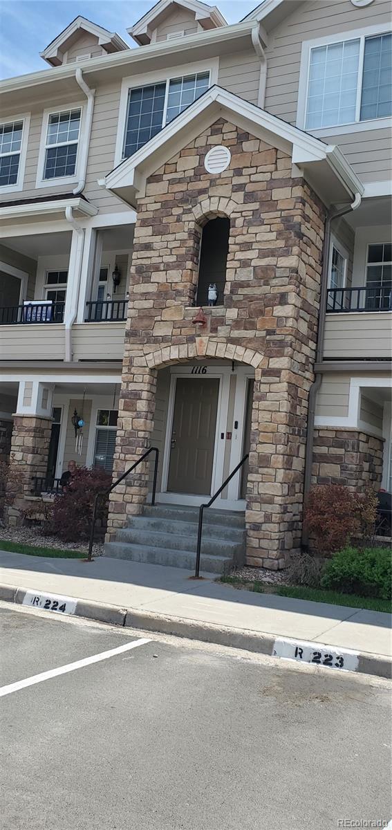 12711 Colorado Blvd Unit 1116, Thornton, CO 80241 - view of front of property with stone siding
