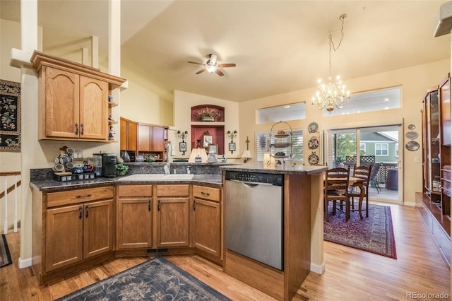 kitchen featuring sink, stainless steel dishwasher, kitchen peninsula, ceiling fan with notable chandelier, and light wood-type flooring