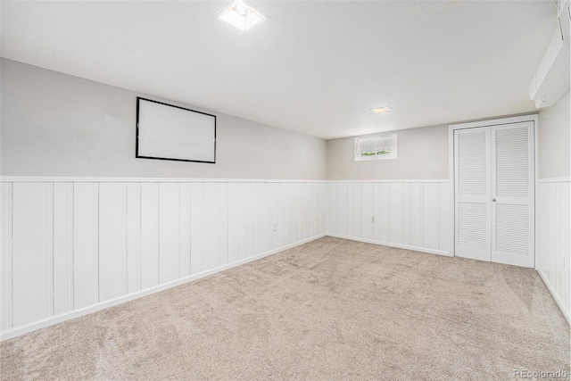 8525 Grandview Ave, Arvada, CO 80002 - below grade area with a wainscoted wall and carpet floors