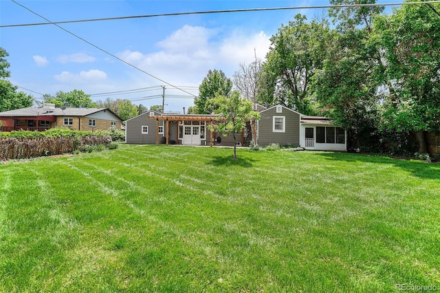8525 Grandview Ave, Arvada, CO 80002 - view of green lawn with a sunroom