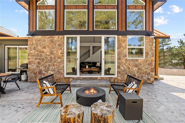 518 Conifer Dr, Bailey, CO 80421 - view of patio with a fire pit and area for grilling