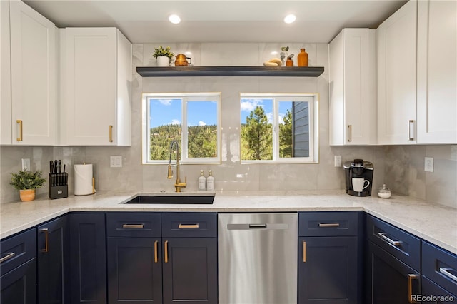 518 Conifer Dr, Bailey, CO 80421 - kitchen with dishwasher, white cabinetry, backsplash, light stone countertops, and recessed lighting