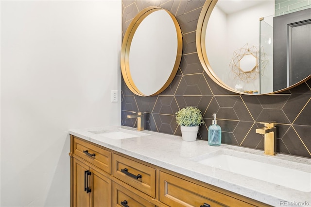 518 Conifer Dr, Bailey, CO 80421 - bathroom with tasteful backsplash and double vanity