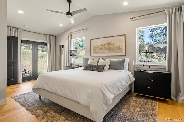 518 Conifer Dr, Bailey, CO 80421 - bedroom with access to outside, vaulted ceiling, multiple windows, recessed lighting, and wood finished floors