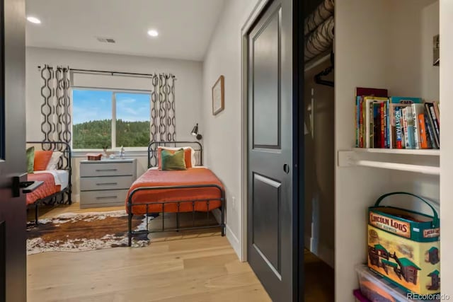 518 Conifer Dr, Bailey, CO 80421 - sitting room with wood finished floors and recessed lighting