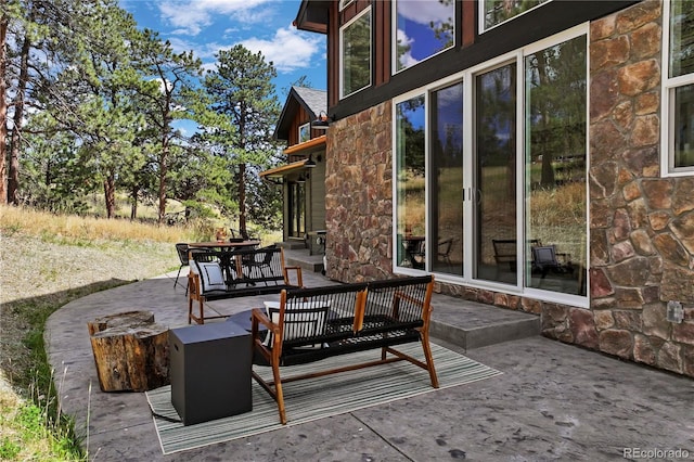 518 Conifer Dr, Bailey, CO 80421 - view of patio featuring outdoor lounge area