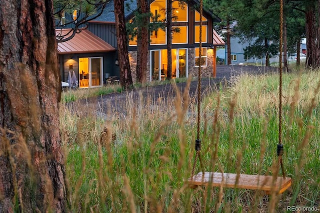 518 Conifer Dr, Bailey, CO 80421 - rear view of property featuring a standing seam roof and a metal roof