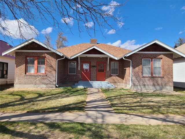 view of front of house with a front yard