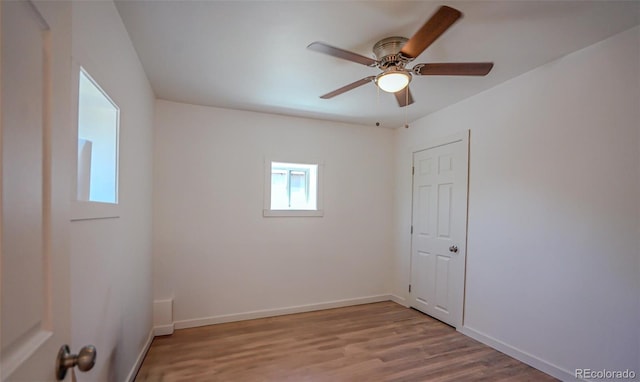 327 E 7th St, Walsenburg, CO 81089 - spare room featuring wood finished floors, ceiling fan, and baseboards