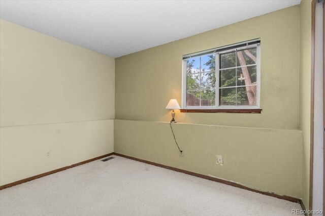 13341 Birch Cir, Thornton, CO 80241 - carpeted spare room featuring baseboards