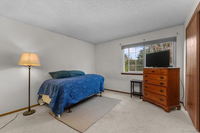 13341 Birch Cir, Thornton, CO 80241 - bedroom with light carpet and a textured ceiling