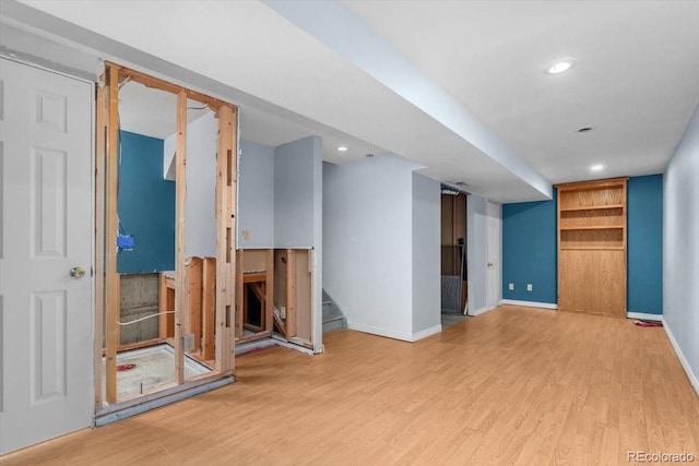 13341 Birch Cir, Thornton, CO 80241 - unfurnished living room with wood finished floors, stairway, and recessed lighting