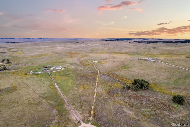 aerial view at dusk with a rural view