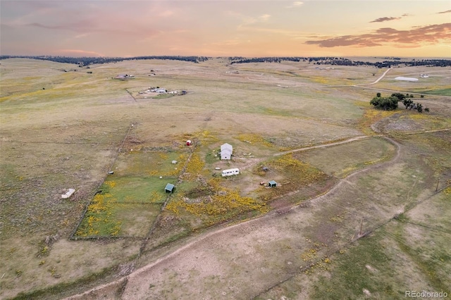 aerial view at dusk with a rural view