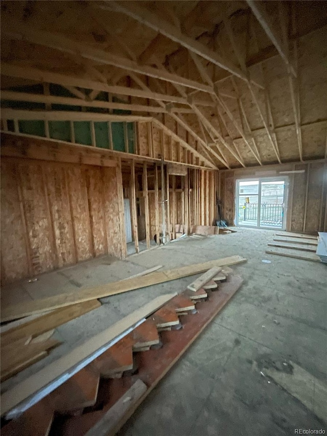 miscellaneous room featuring lofted ceiling