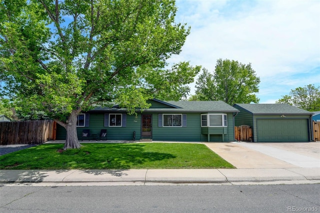 5986 Dunraven St, Golden, CO 80403 - ranch-style home featuring concrete driveway and an attached garage