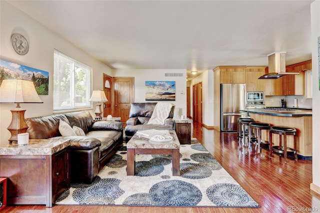 5986 Dunraven St, Golden, CO 80403 - living room featuring hardwood / wood-style flooring