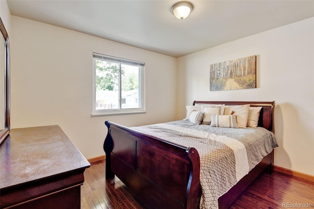 5986 Dunraven St, Golden, CO 80403 - bedroom with hardwood / wood-style floors and baseboards