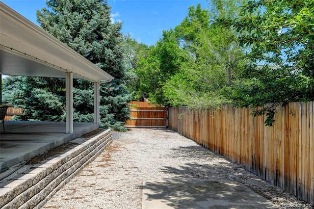 5986 Dunraven St, Golden, CO 80403 - view of yard featuring a patio area