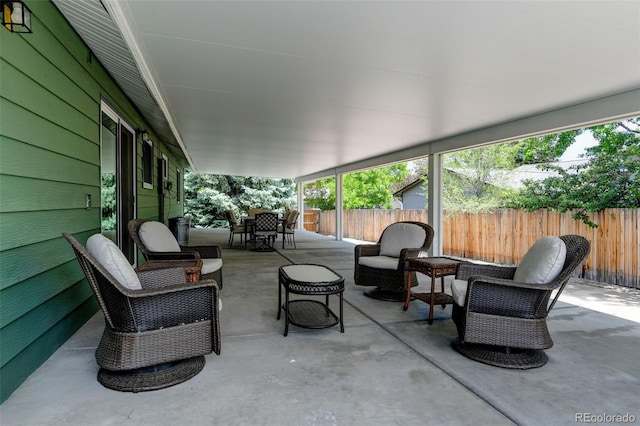 5986 Dunraven St, Golden, CO 80403 - view of patio with outdoor dining space and an outdoor living space
