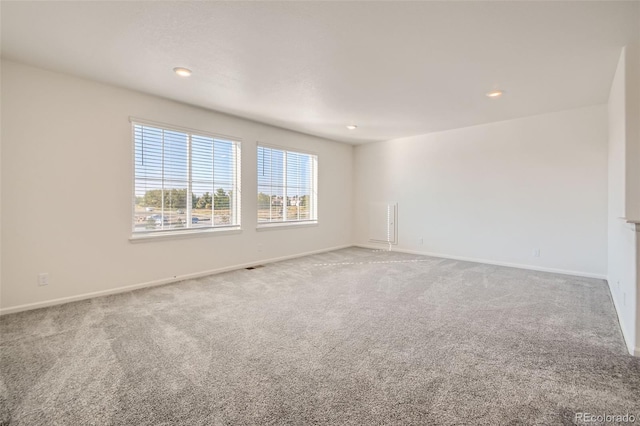 4403 Picadilly Ct, Aurora, CO 80019 - carpeted spare room with baseboards and recessed lighting