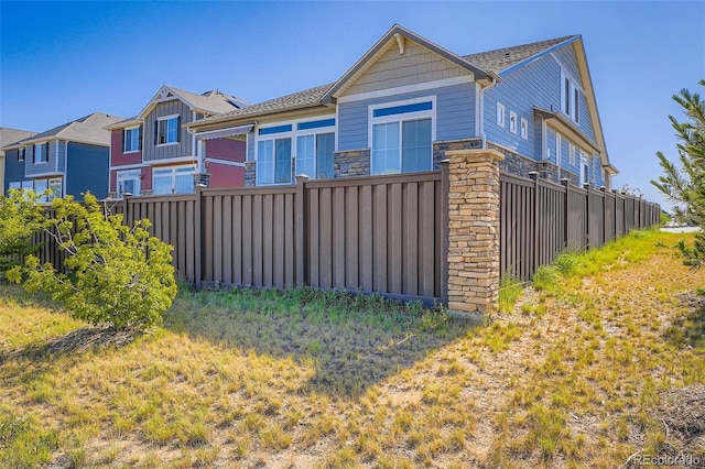 4403 Picadilly Ct, Aurora, CO 80019 - view of front of home featuring stone siding