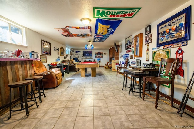 game room featuring light tile patterned flooring, billiards, and baseboards