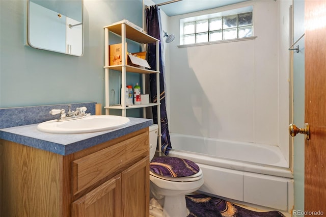 full bath with toilet, shower / bathtub combination with curtain, and vanity