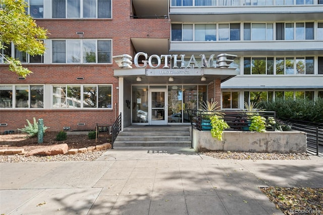 1196 N Grant St Unit 407, Denver, CO 80203 - property entrance featuring brick siding