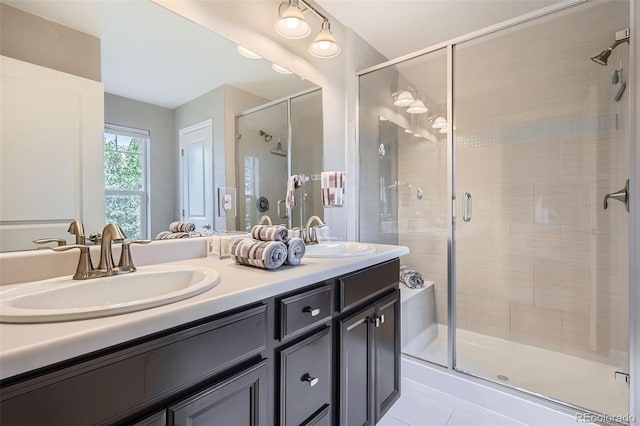 1519 S Dayton St, Denver, CO 80247 - full bath featuring double vanity, a shower stall, and tile patterned floors