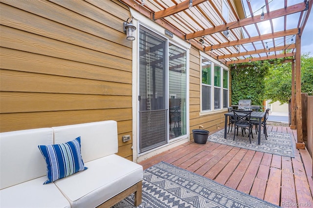 1519 S Dayton St, Denver, CO 80247 - wooden deck featuring outdoor dining space and a pergola
