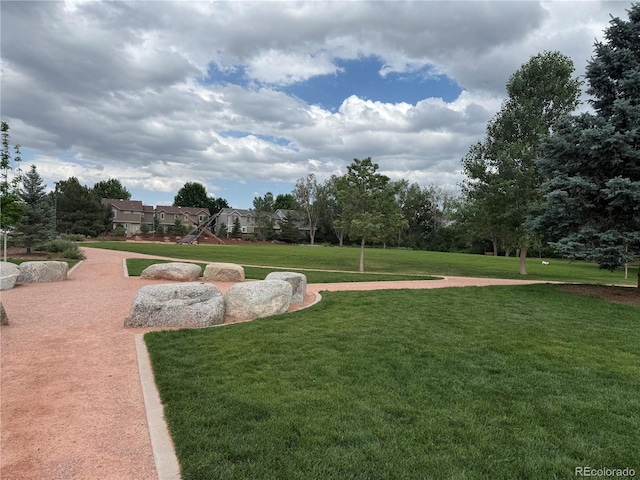 1519 S Dayton St, Denver, CO 80247 - view of property's community with a lawn