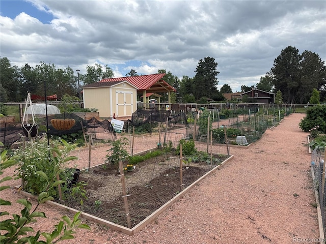 1519 S Dayton St, Denver, CO 80247 - view of jungle gym with a garden and a storage shed