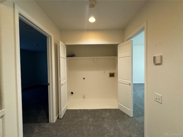 interior space featuring dark colored carpet