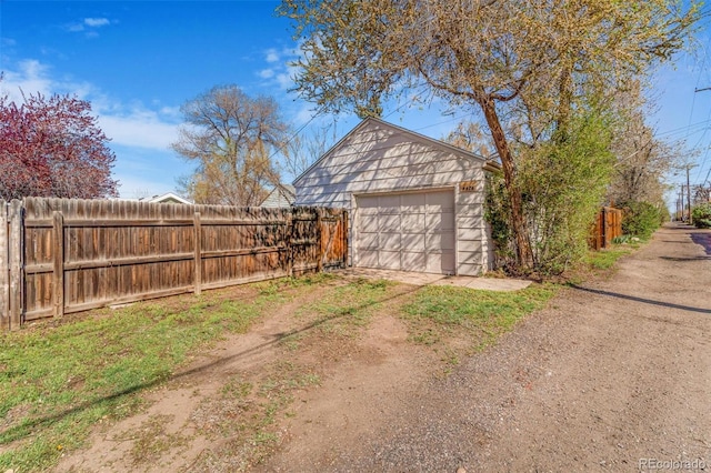 4476 S Lincoln St, Englewood, CO 80113 - detached garage featuring fence and dirt driveway