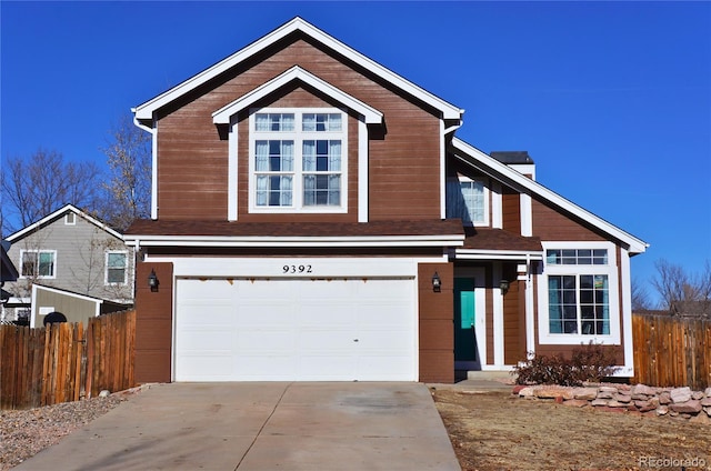 view of front of property with a garage