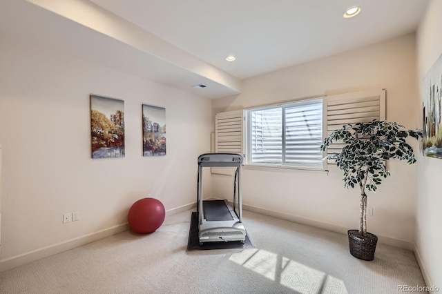exercise area featuring carpet flooring, recessed lighting, baseboards, and visible vents