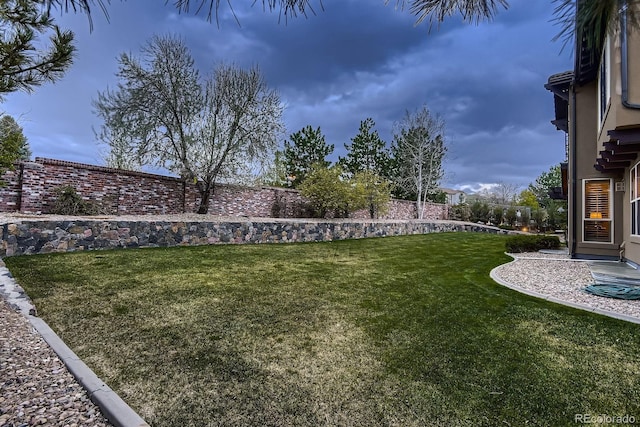 view of yard featuring a fenced backyard